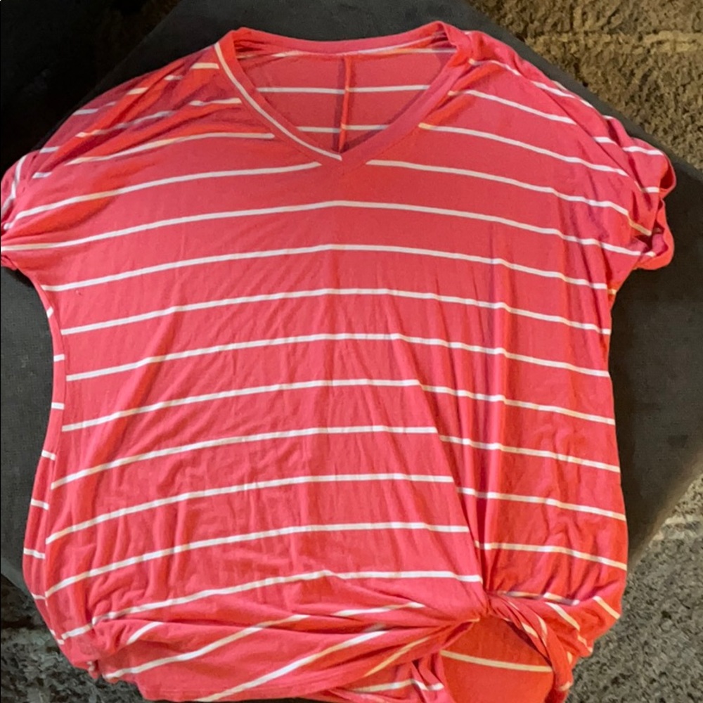 Pink and white striped V-neck top
